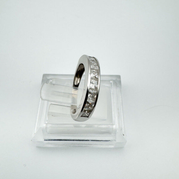 Side view of a 0.90ct Moissanite princess-cut channel set half hoop band in sterling silver 925.