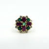 Front view of vintage 18ct gold cluster ring with rubies, emeralds and diamonds in claw settings