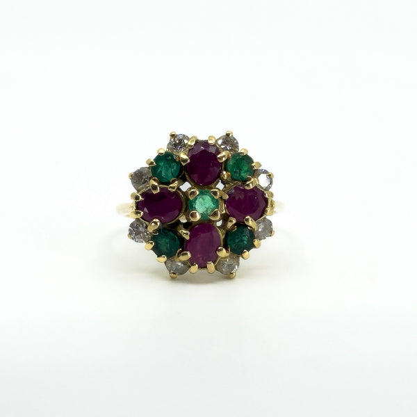 Front view of vintage 18ct gold cluster ring with rubies, emeralds and diamonds in claw settings