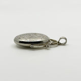 Vintage Sterling Silver Articulated Oval Foliate Engraved Locket 925 (Birm 1997)