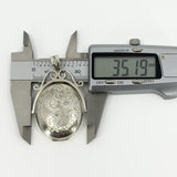 Vintage Sterling Silver Articulated Oval Foliate Engraved Locket 925 (Birm 1997)