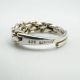 Close-up of 925 Germany hallmark stamped on sterling silver ring band