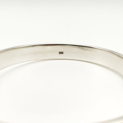 Close-up of 925 hallmark inside sterling silver buckle bracelet