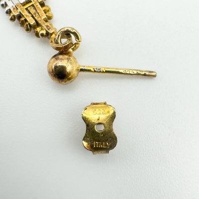 Close-up of gold vermeil earring post and butterfly back marked 925 and ITALY