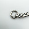 Close-up of 925 LAA hallmark on foxtail bracelet end ring