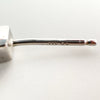 Macro close-up of the 925 hallmark and maker's mark on the earring post
