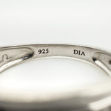 Close-up of sterling silver ring hallmarked 925 and DIA inside the band