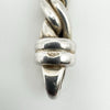 Close-up of 925 hallmark stamped on the end of the twisted silver link