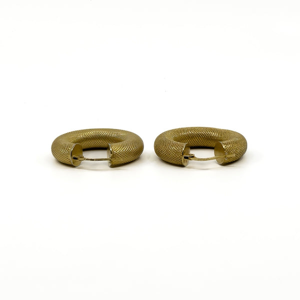 Back view of the 9ct gold mesh hoop earrings showing the hinged fittings and rounded mesh shape.