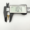 Digital caliper measuring the width of a vintage 9ct gold tower charm pendant at 10.4mm