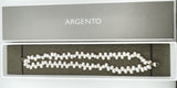 Double row pearl bracelet laid in box with ARGENTO branding