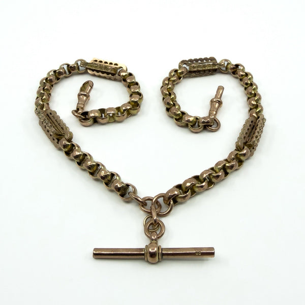 Antique 9ct rose gold Albert chain arranged in a heart shape with T bar and dog clips