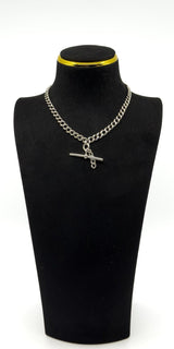 Antique sterling silver Albert chain with T-bar and drop links, shown on a black display bust.