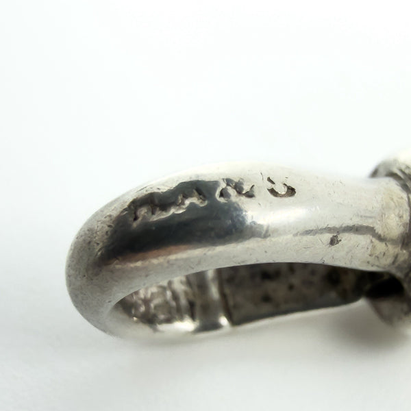 Sterling silver Albert chain on a display bust with T-bar fastening, showing how the 15.5 inch length sits.