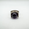 Bold amethyst ball nestled in modernist sterling silver ring, full front angle