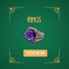 Silver ring with large purple amethyst gemstone on green background