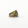Angled view of antique Georgian amethyst trilogy ring with three oval cut stones in gold settings