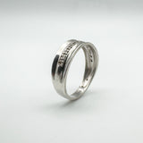 Angled view showing diamond setting and inside band marked 925 and DIA