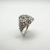 Angled view of Pandora Darling Daisy ring with enamel and CZs