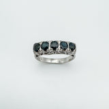 Sterling silver ring with 0.75ct sapphires viewed at an angle to show gem depth