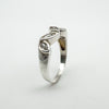 Tapered band design with three marquise CZ stones in focus