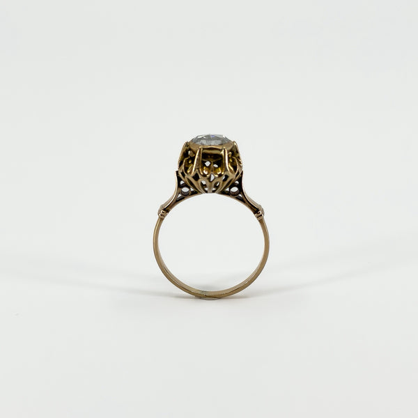 Side profile of antique 14ct rose gold ring showing the raised rose-cut diamond setting and detailed shoulders.