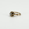 Opposite side view of antique 14ct rose gold ring showing the rose-cut diamond, prongs and detailed shoulder.