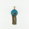 Front view of Victorian 18ct gold pendant with pavé turquoise, rose-cut diamond and articulated gold tassels.