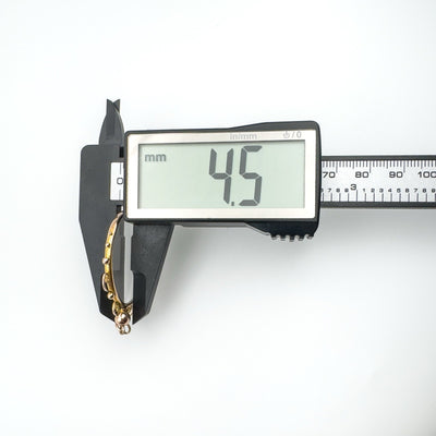 Depth of antique gold locket measured at 4.5mm