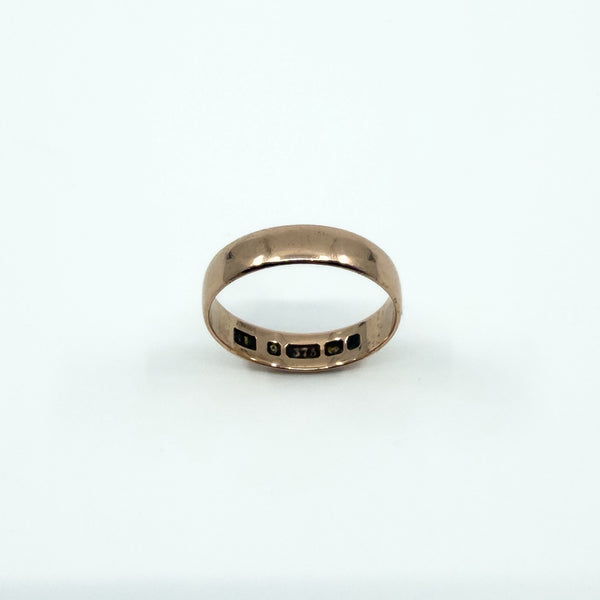Antique 9ct rose gold plain band ring showing SH, 9, 375, anchor and date letter marks