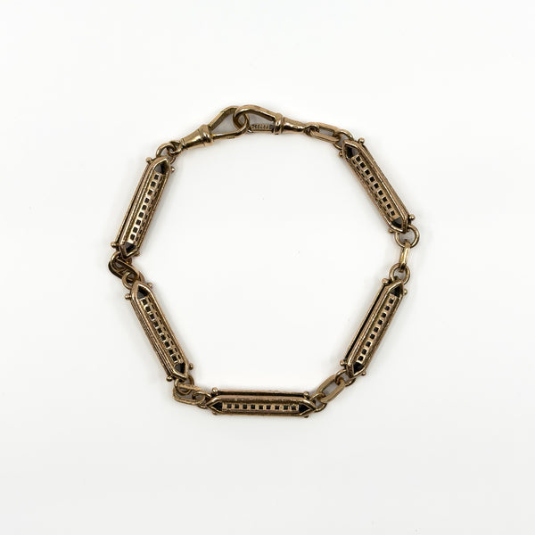Antique 9ct rose gold bracelet with ornate fancy links and double dog clip fittings