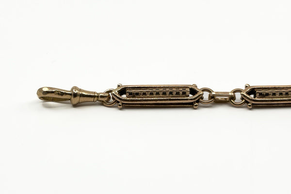 Detailed view of the antique 9ct rose gold bracelet link pattern and warm gold tone