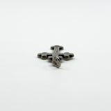 Close view of the large bail on the antique engraved silver cross pendant from the end