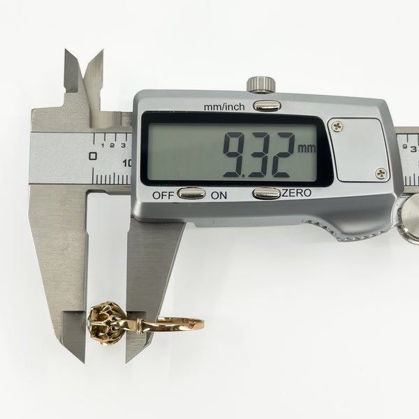 Digital caliper measuring approximately 9.32mm across the visible depth of the antique diamond ring setting.