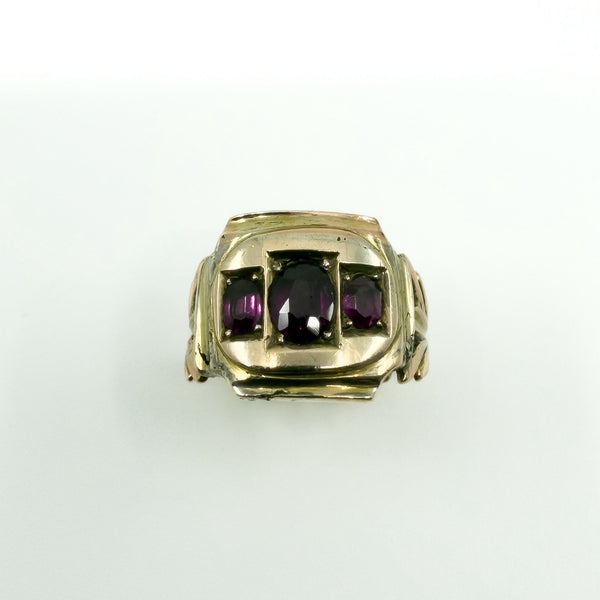 Antique Georgian 9ct gold amethyst trilogy ring with three oval cut purple stones