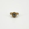 Front view of antique 14ct rose gold solitaire ring showing the rose-cut diamond and decorative setting.