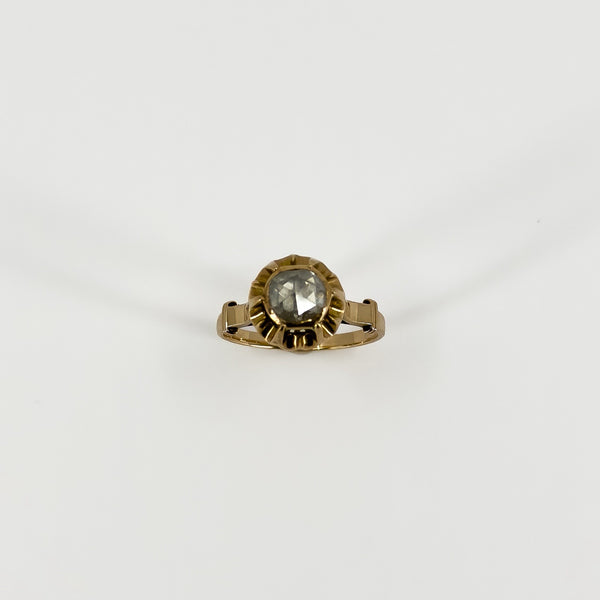Full front view of antique 14ct rose gold solitaire ring with a natural rose-cut diamond in its decorative setting.