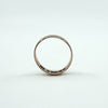 Antique 9ct rose gold band ring standing upright with inner Birmingham hallmarks visible
