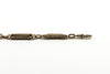 Antique rose gold bracelet showing fancy links and one dog clip fitting