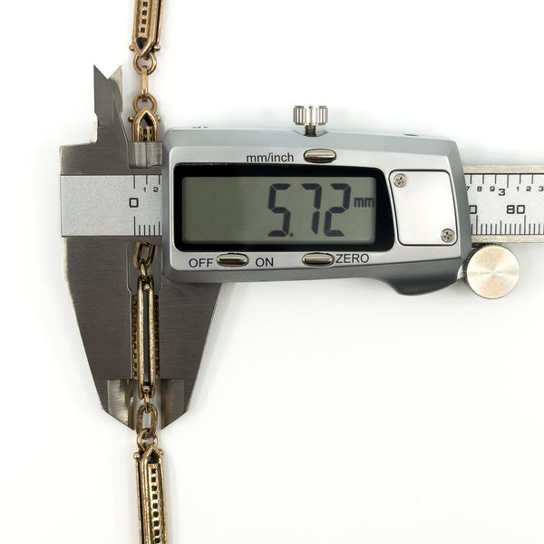 Antique rose gold bracelet fancy link measured on digital calipers at 5.72mm