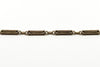 Close up of antique rose gold bracelet links with ornate shaped fancy link detail