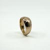 Three-quarter view of antique 12ct rose gold wide band ring Size J, showing chunky width and engraving