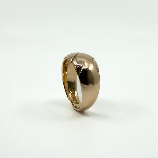 Three-quarter view of antique 12ct rose gold wide band ring Size J, showing chunky width and engraving