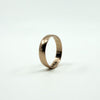 Antique 9ct rose gold plain band ring shown upright with a polished rose gold finish