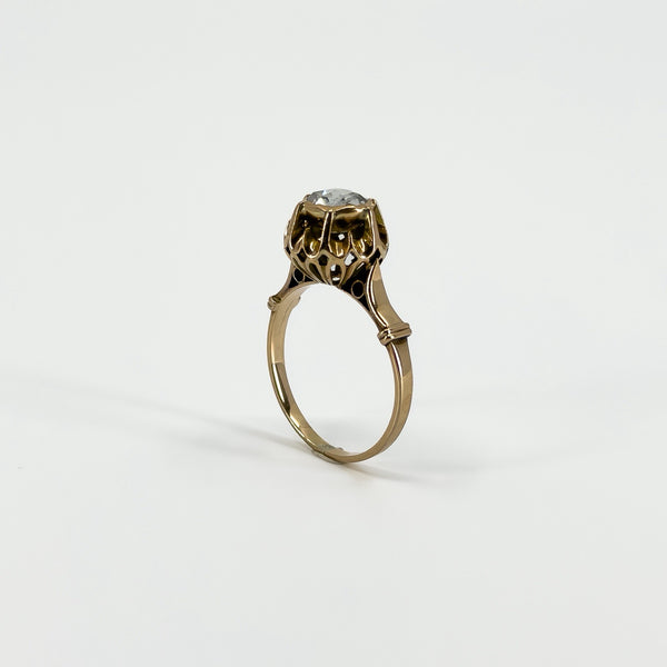 Upright profile of the antique 14ct rose gold ring showing the raised rose-cut diamond setting and shoulders.