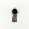 Reverse of Victorian 18ct gold tassel locket showing the removable glass-backed keepsake compartment.