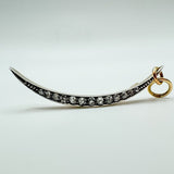 Antique crescent moon pendant set with old cut diamonds in silver and 18ct rose gold