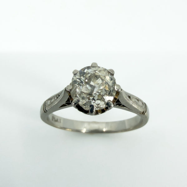 Antique platinum old cut diamond solitaire ring with eight-claw setting, front view