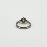 Back view of antique platinum old-cut diamond solitaire ring showing the gallery and shank