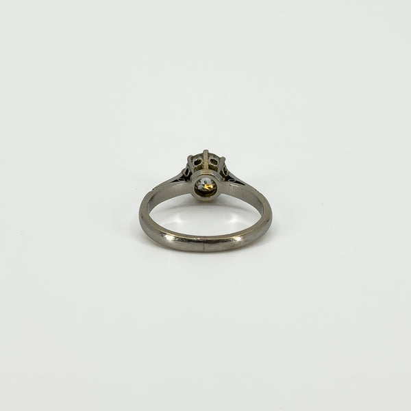 Back view of antique platinum old-cut diamond solitaire ring showing the gallery and shank